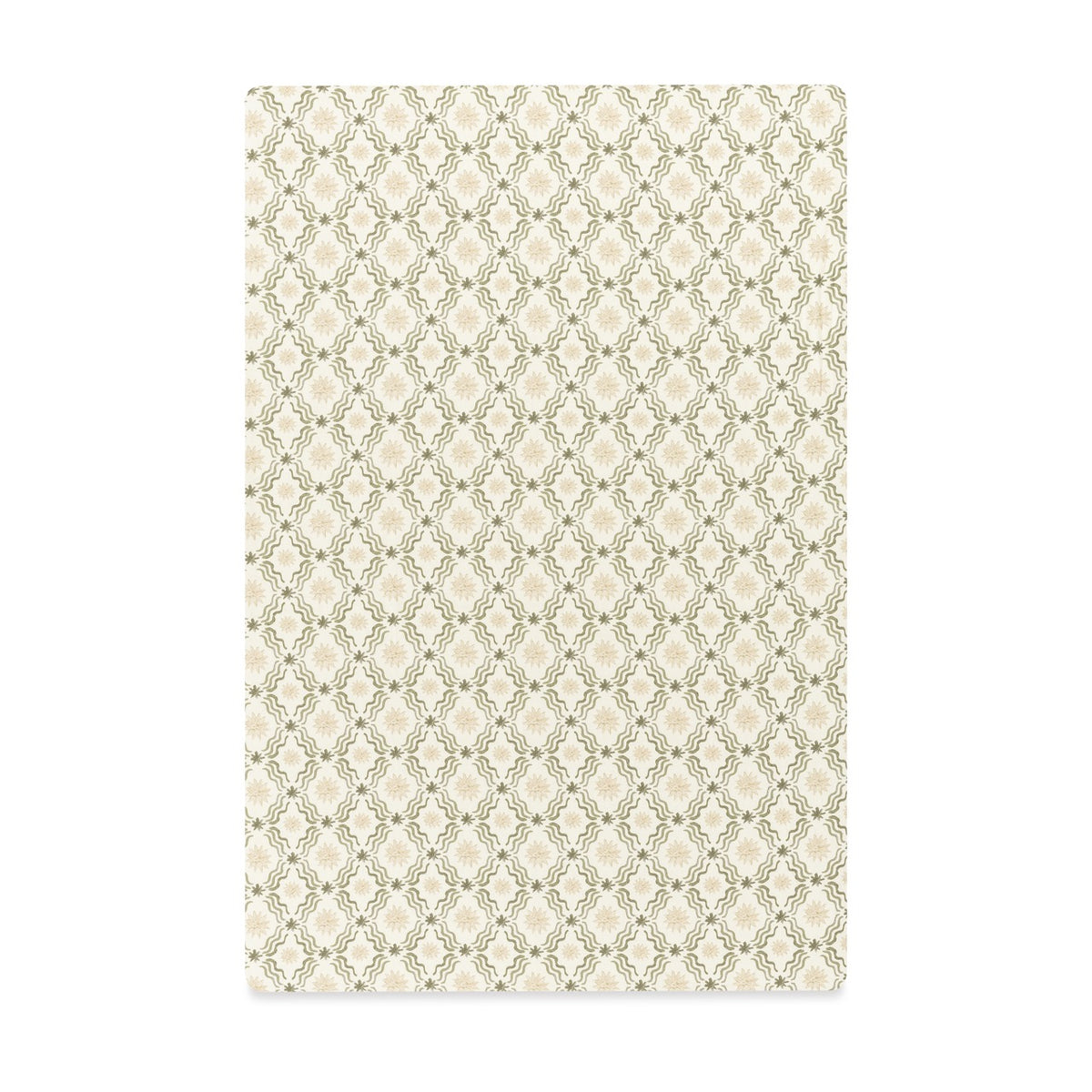 Babyletto crib sheet with a repeating green and cream diamond floral pattern