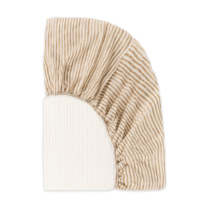 Babyletto oval crib sheet with tan and white vertical stripes