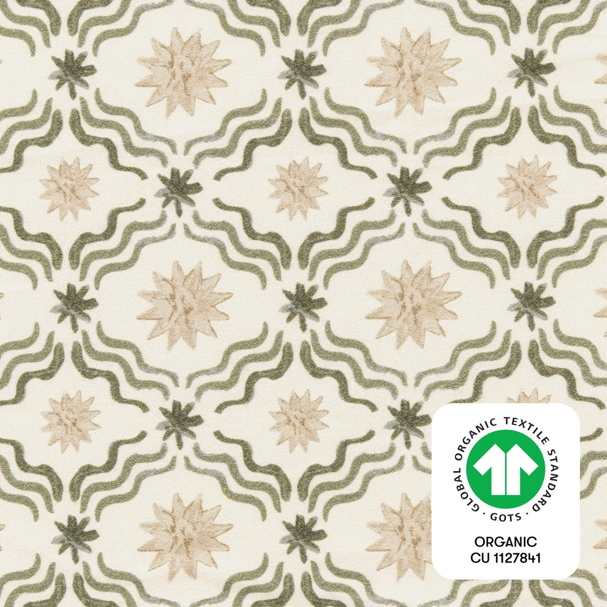 Babyletto fabric with green wavy lines and beige star patterns featuring a GOTS organic certification label