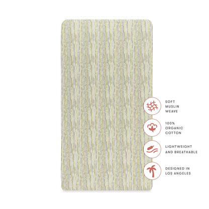 Babyletto organic cotton muslin crib sheet with olive green pinstripe pattern and feature icons