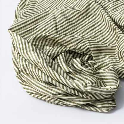 Babyletto fitted crib sheet with olive green and white diagonal stripes