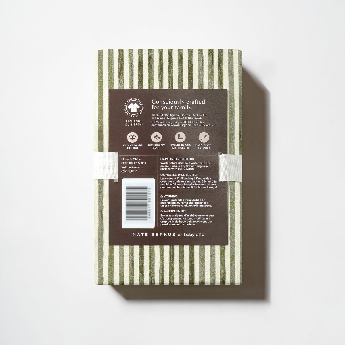 Babyletto Nate Berkus organic cotton crib sheet packaging with product information and care instructions