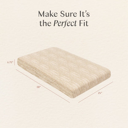 Babyletto striped mattress pad with dimensions 38 inches by 24 inches by 6.75 inches