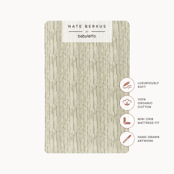 Babyletto Nate Berkus mini crib sheet with olive green vertical stripes and product feature icons