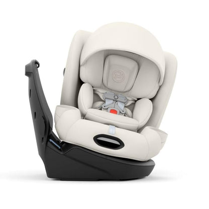 Cybex off-white infant car seat with black base and canopy
