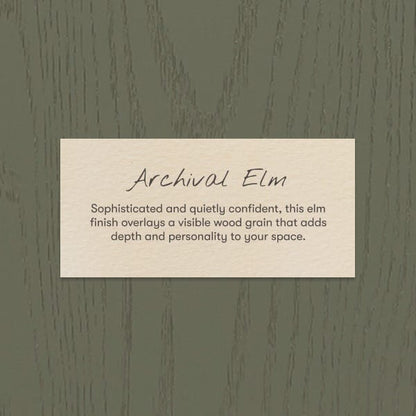 Babyletto Archival Elm wood finish swatch with visible grain texture