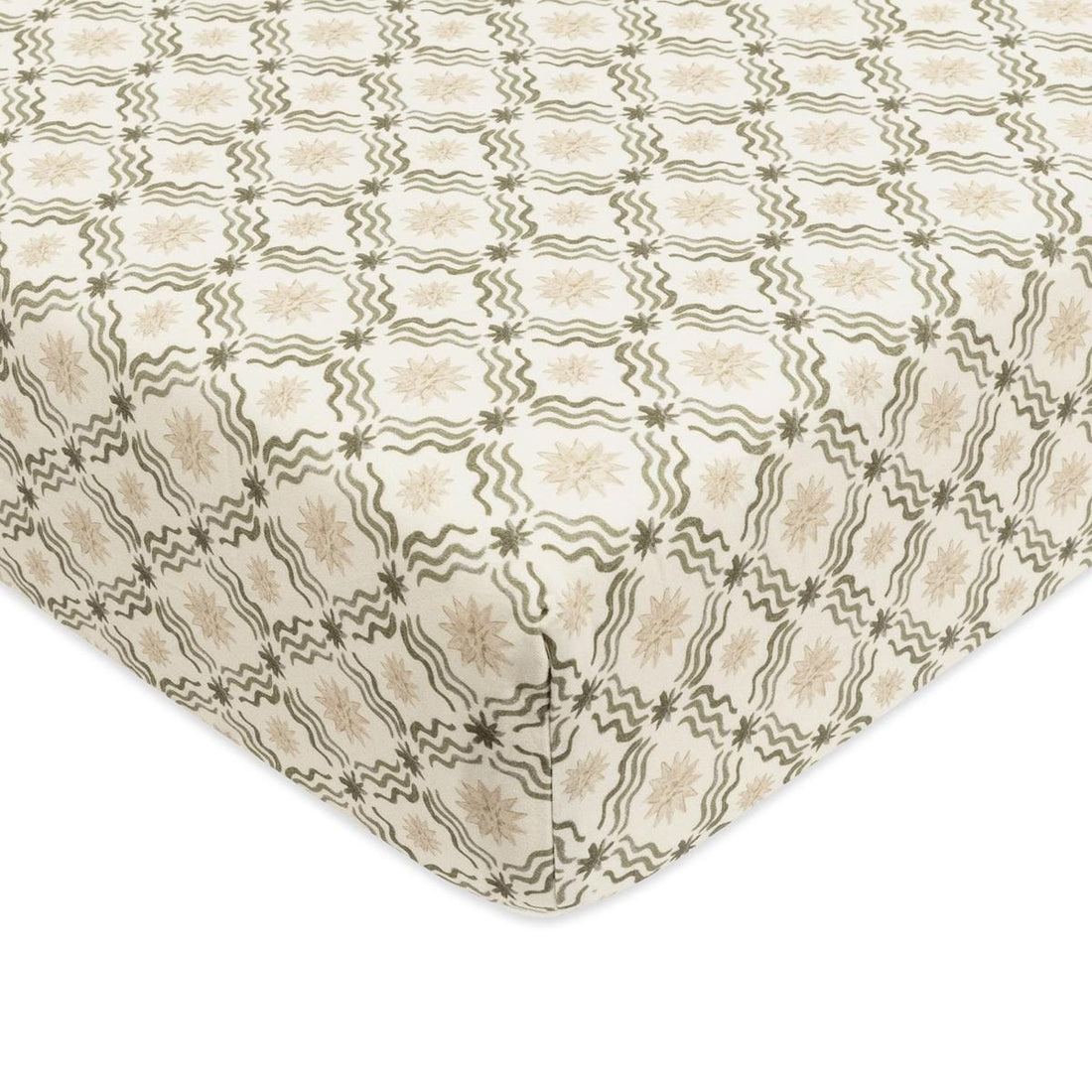 Babyletto crib sheet with cream background and olive green wavy line and star pattern