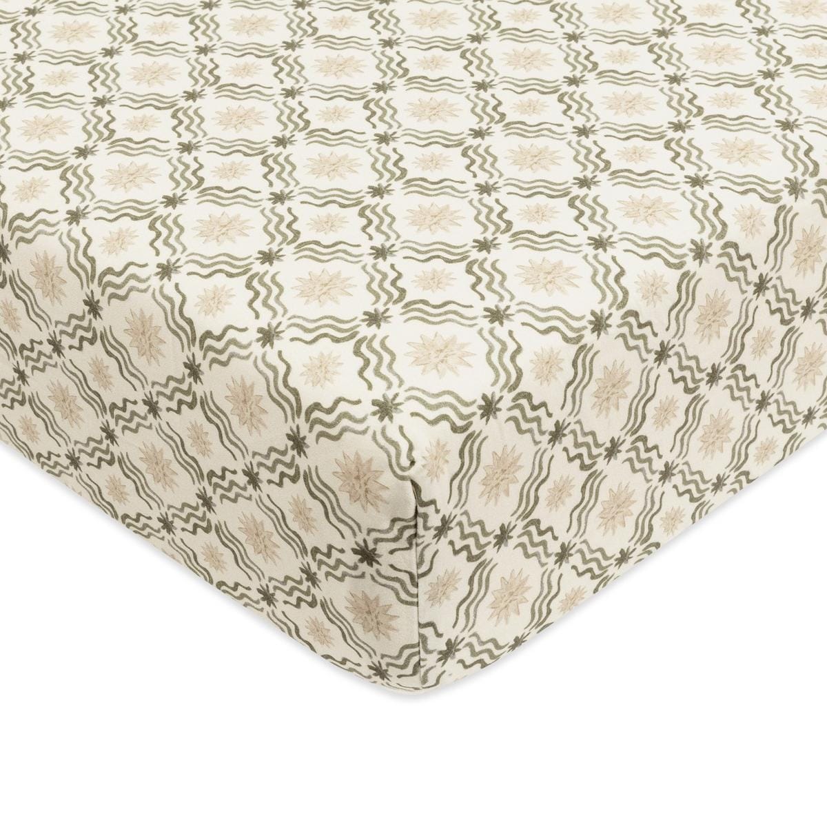 Babyletto crib sheet with cream background and olive green wavy line and star pattern