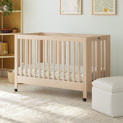 Babyletto Maki Full-Size Portable Folding Crib w/Toddler Bed Conversion Kit - Washed Natural - M6601NX