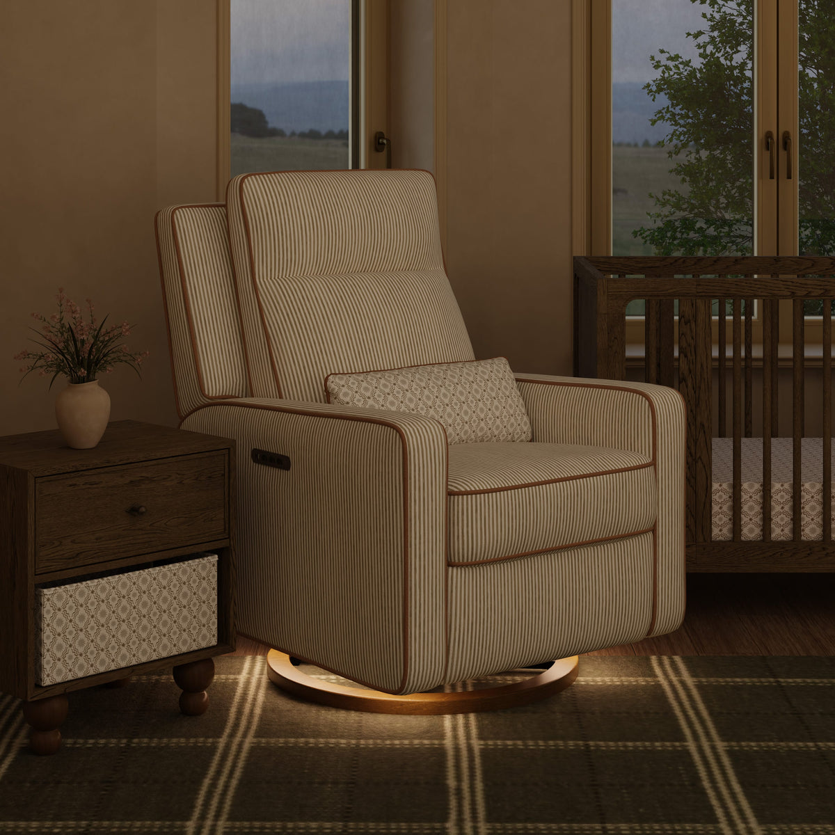 Babyletto striped swivel glider recliner with lumbar pillow in nursery setting