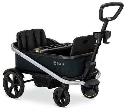 Nightfall 3-seater stroller wagon by BOB with black fabric, silver frame, cup holders, and rugged wheels, side view