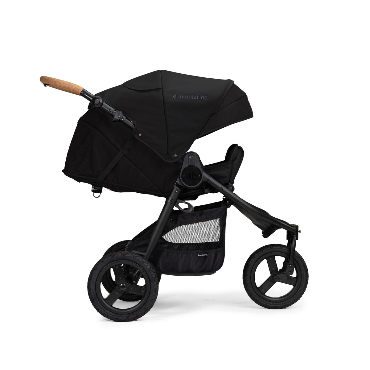 Black Bumbleride stroller with cork handle and storage basket