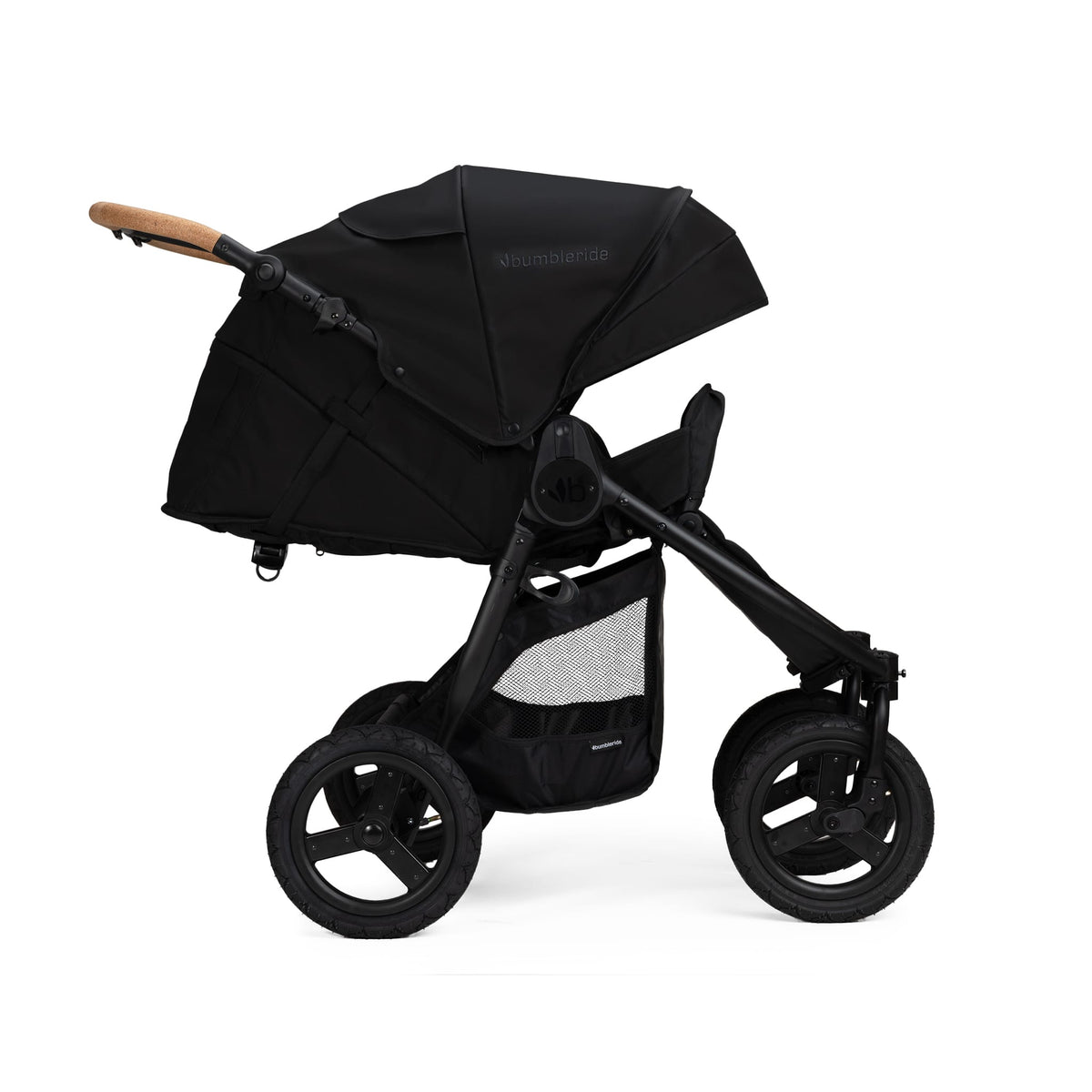 Black Bumbleride stroller with cork handle and storage basket