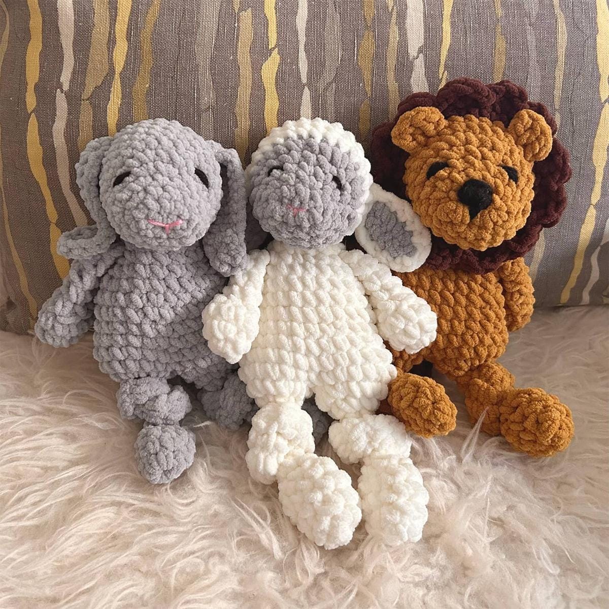 Cheengoo crochet plush toys including a grey bunny, white lamb, and brown lion