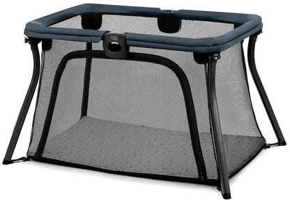 Midnight blue lightweight travel playard by Chicco with mesh sides, black frame, and padded top rail, front view