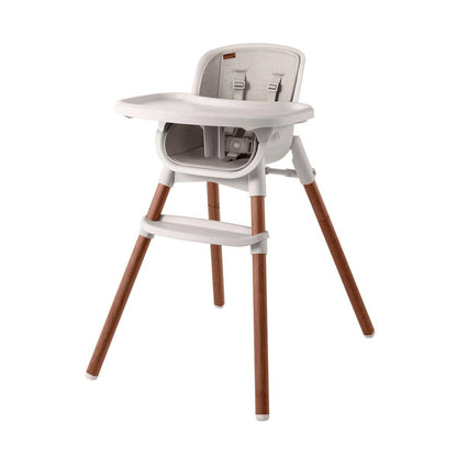 Beige high chair with wooden legs and white tray