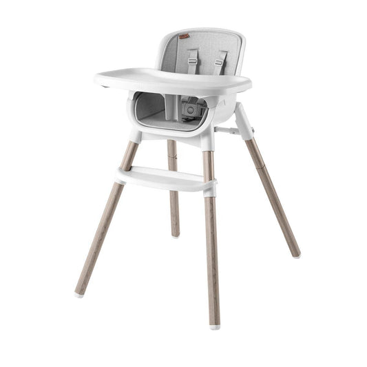White high chair with light wood legs and grey fabric seat cushion