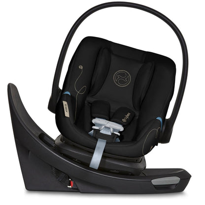 Moon black rotating infant car seat by Cybex with swivel base, SensorSafe technology, and gold stitching details, side view