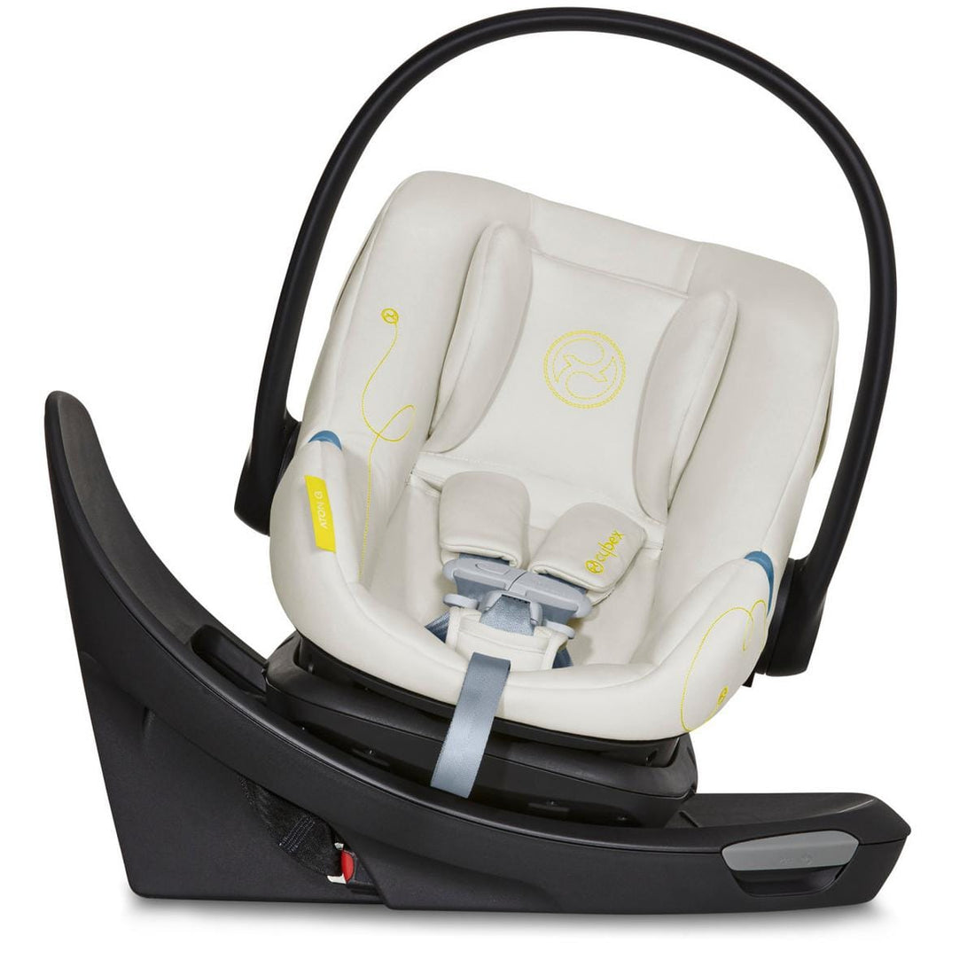 Seashell beige infant car seat by Cybex with yellow stitching, black frame, and rotating base, front view