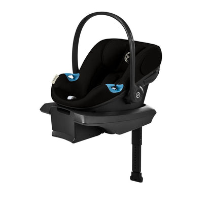 Black infant car seat with load leg base by Cybex, featuring moon black fabric, blue harness accents, and side-impact protection, shown in front view.