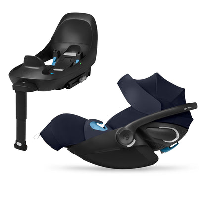 Ocean blue infant car seat by Cybex with black plastic shell, side view showing harness and extendable comfort features