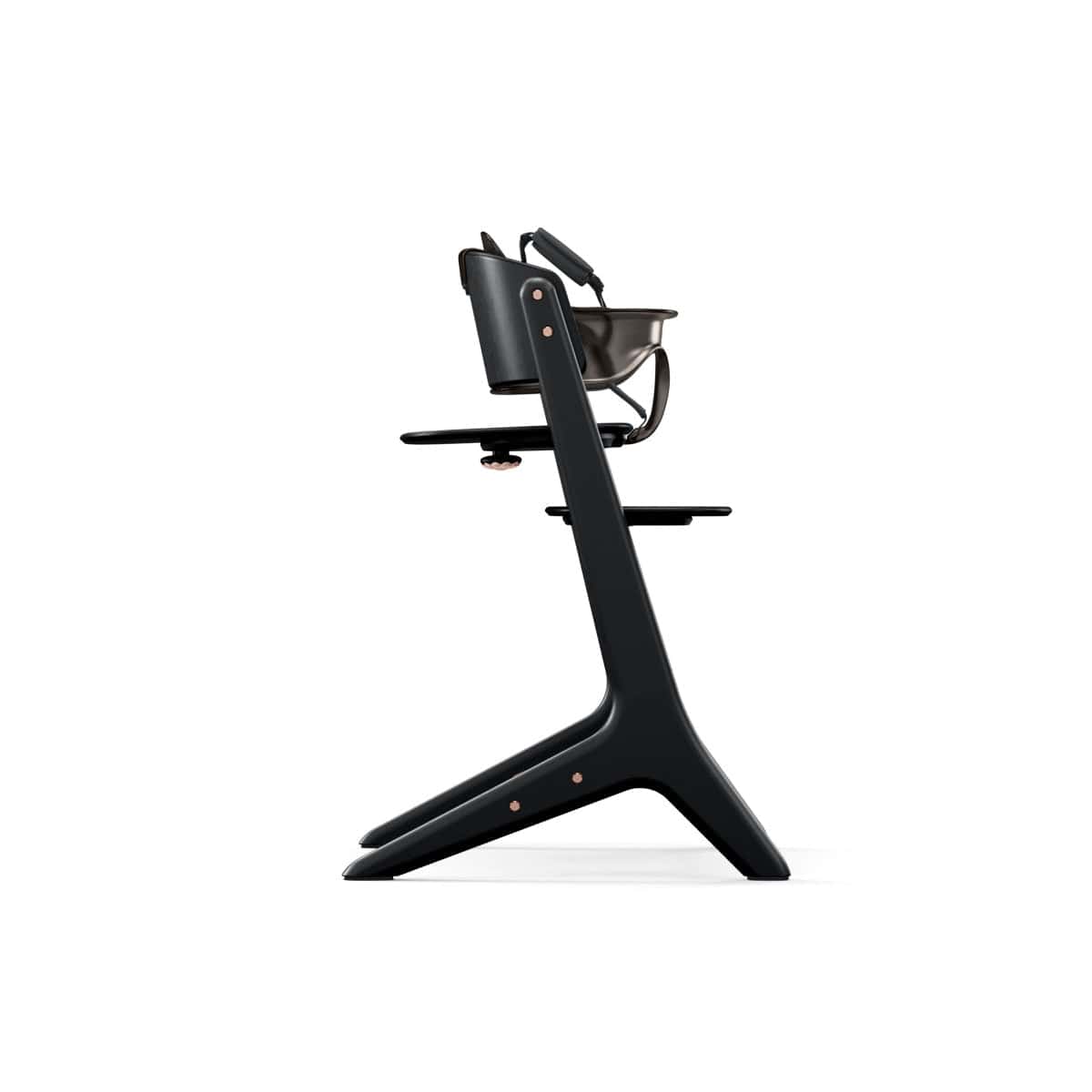 Side view of a black Stokke Tripp Trapp high chair with baby set