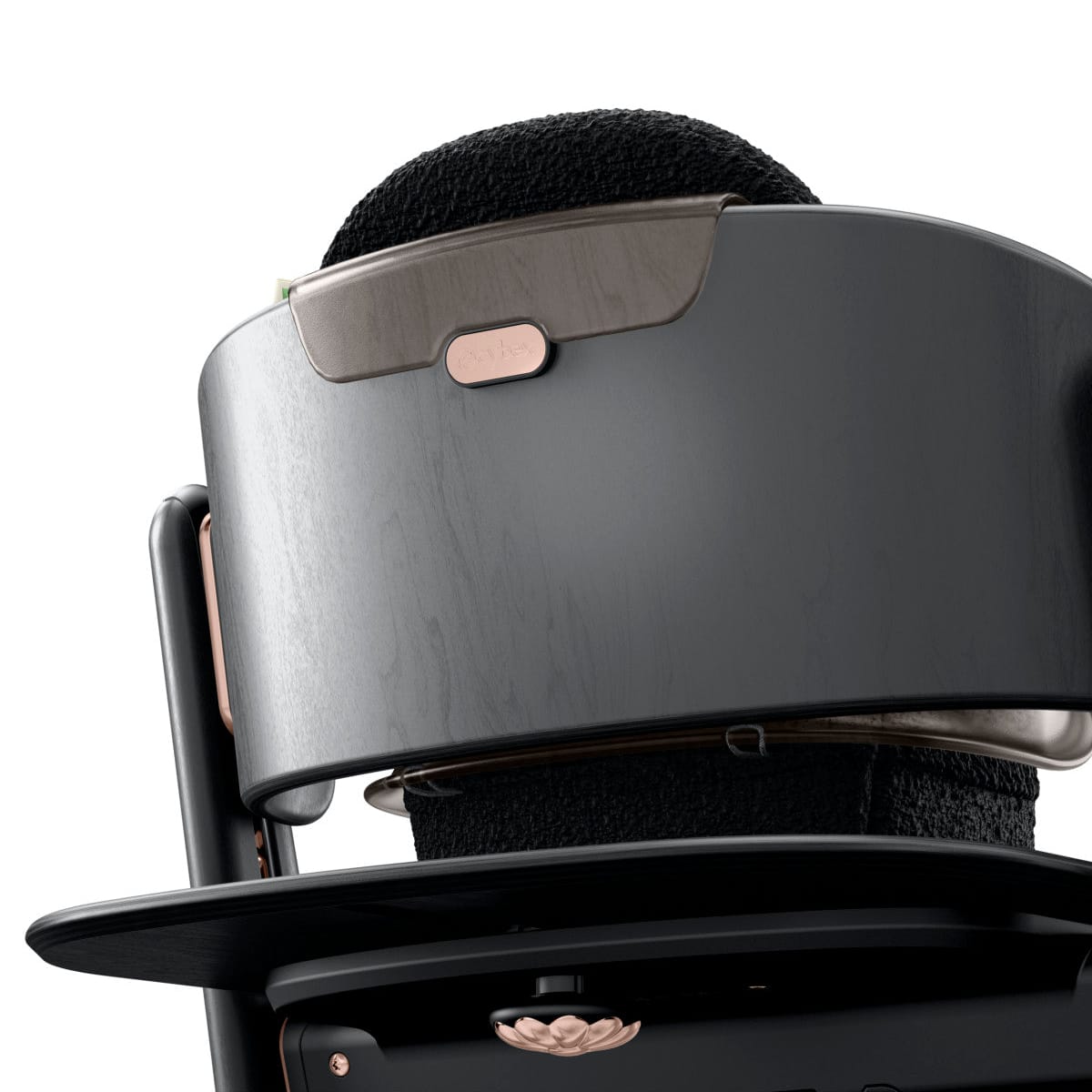 Close up of Cybex high chair backrest with wood grain finish and rose gold logo detail