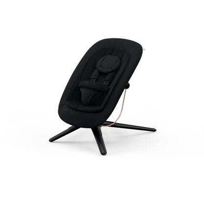 Cybex black baby bouncer with a textured fabric seat and a black frame