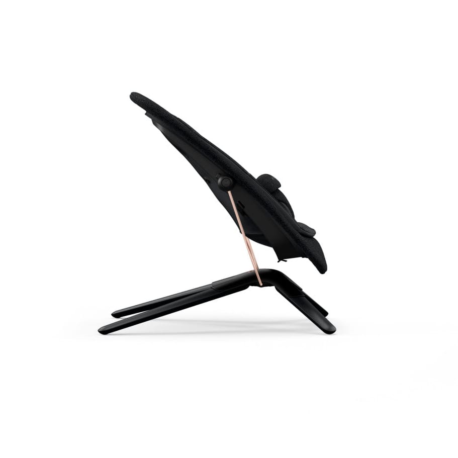 Side view of black Cybex baby bouncer with rose gold frame