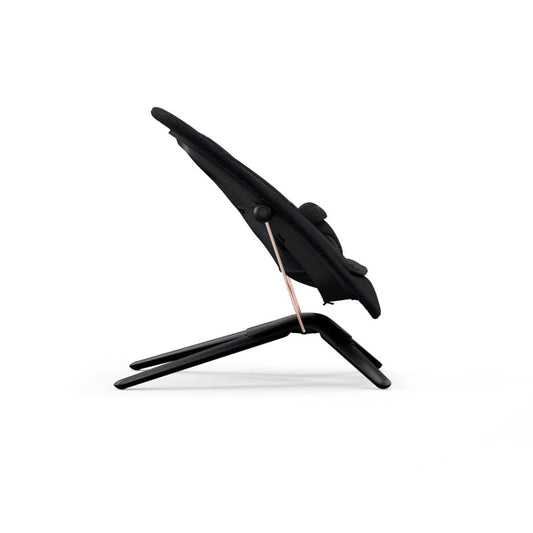 Cybex black baby bouncer with a textured fabric seat and a black frame