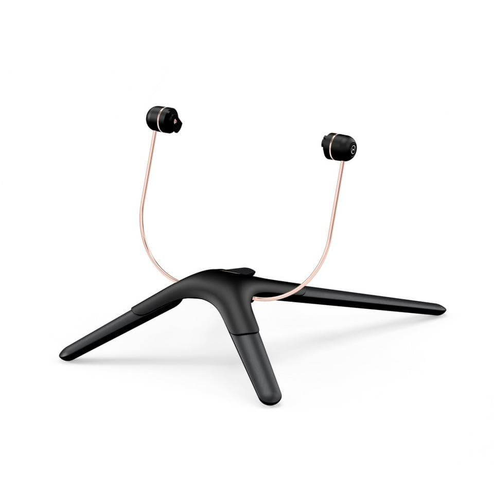 Black and rose gold wireless earbuds on a black tripod stand