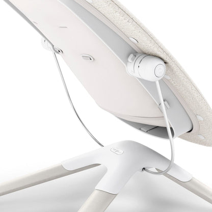 Close up of the white Cybex baby bouncer frame and reclining mechanism
