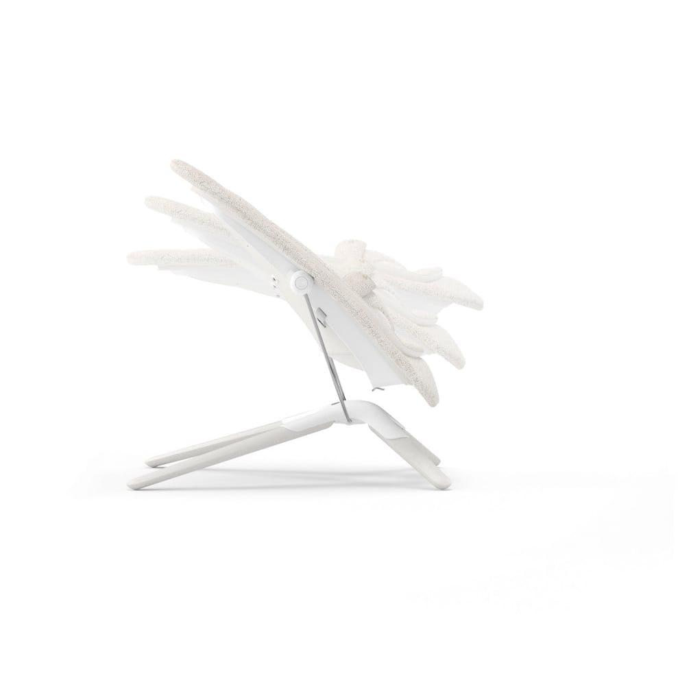Side view of white baby bouncer showing multiple adjustable recline positions