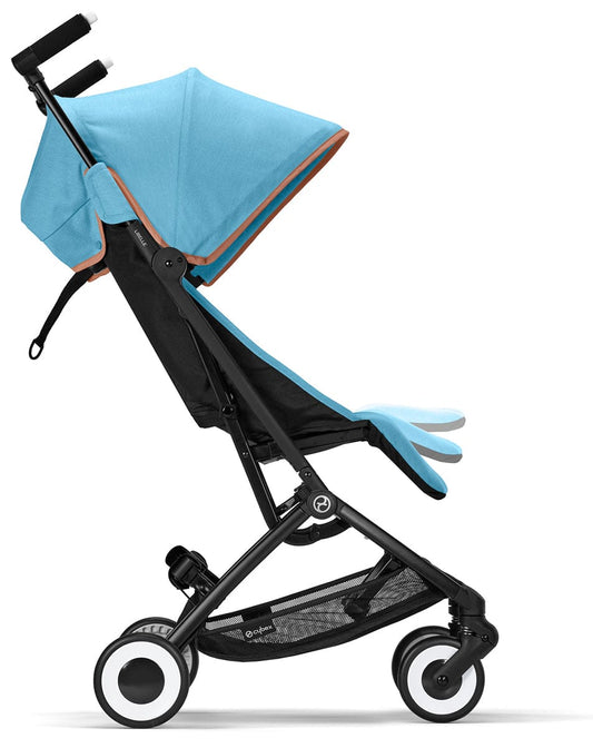 Beach blue compact stroller by Cybex with black frame, white-rimmed wheels, and tan trim accents, front view