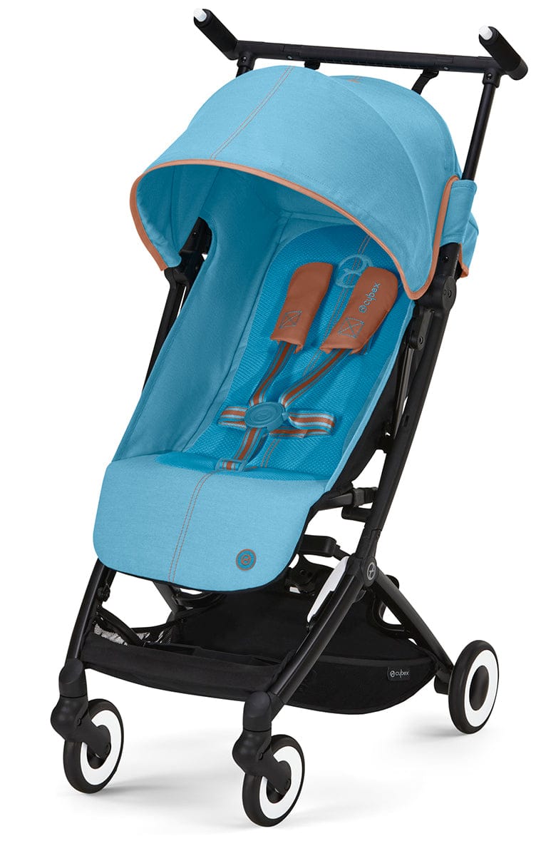 Beach blue compact stroller by Cybex with black frame, white-rimmed wheels, and tan trim accents, front view