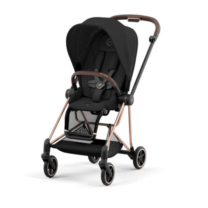 Rose gold and sepia black single stroller by Cybex, featuring black fabric seat, mesh footrest, and four-wheeled frame, front three-quarter view