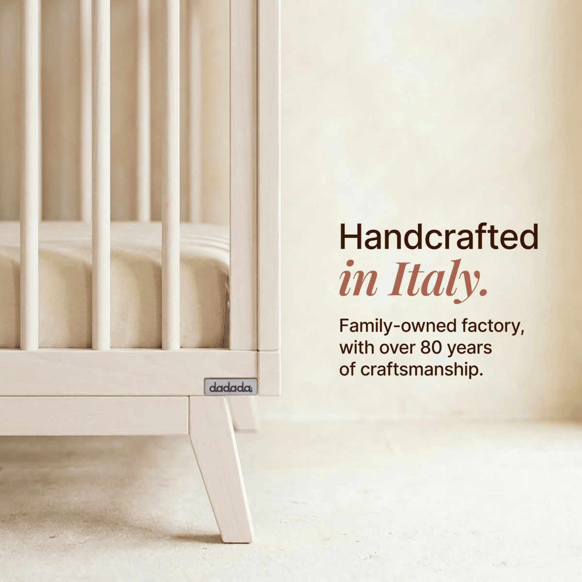Dadada crib side view with text stating handcrafted in Italy by a family owned factory with 80 years of experience