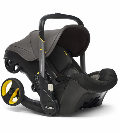 Doona+ Infant Car Seat & Stroller with Handlebar Cover Bundle - Grey Hound / Brown Leather - SP101-10-030-003-SP147-10-025-003