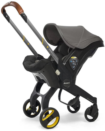 Doona+ Infant Car Seat & Stroller with Handlebar Cover Bundle - Grey Hound / Brown Leather - SP101-10-030-003-SP147-10-025-003