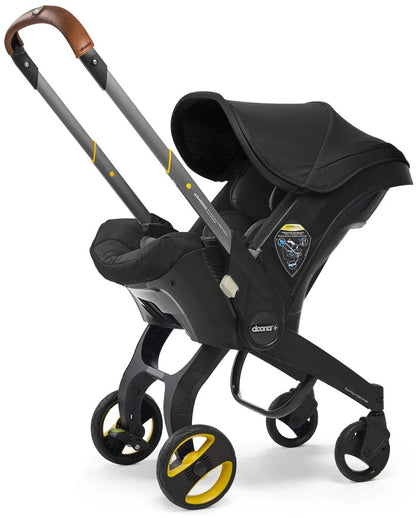 Doona+ Infant Car Seat & Stroller with Handlebar Cover Bundle - Nitro Black / Brown Leather - SP101-10-033-003-SP147-10-025-003
