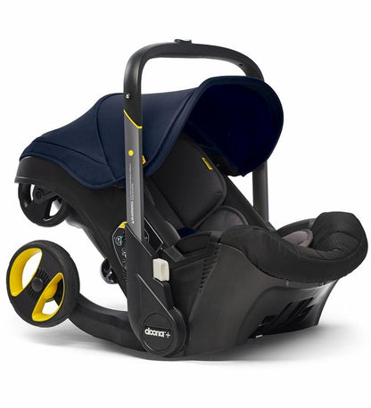 Doona+ Infant Car Seat & Stroller with Handlebar Cover Bundle - Royal Blue / Brown Leather - SP101-10-034-003-SP147-10-025-003