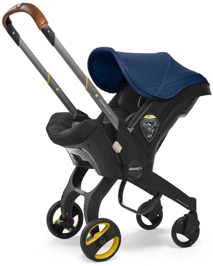 Doona+ Infant Car Seat & Stroller with Handlebar Cover Bundle - Royal Blue / Brown Leather - SP101-10-034-003-SP147-10-025-003
