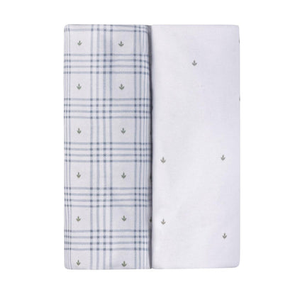 Ely's & Co two pack of crib sheets with blue plaid and white leaf print patterns