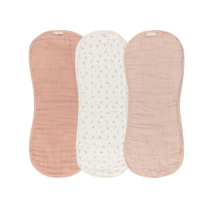 Three Ely's and Co muslin burp cloths in solid pink and floral print