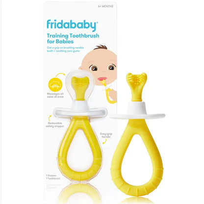 FridaBaby yellow silicone training toothbrush with safety stopper and easy grip handle in packaging