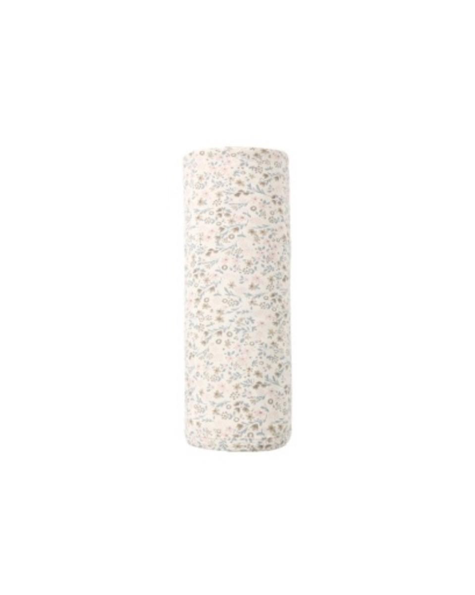 Rolled baby swaddle blanket with a cream background and small floral print