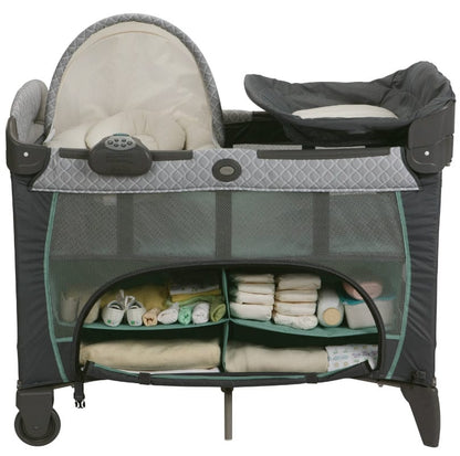 Graco Pack 'n Play Playard with Newborn Napper Station DLX - Manor