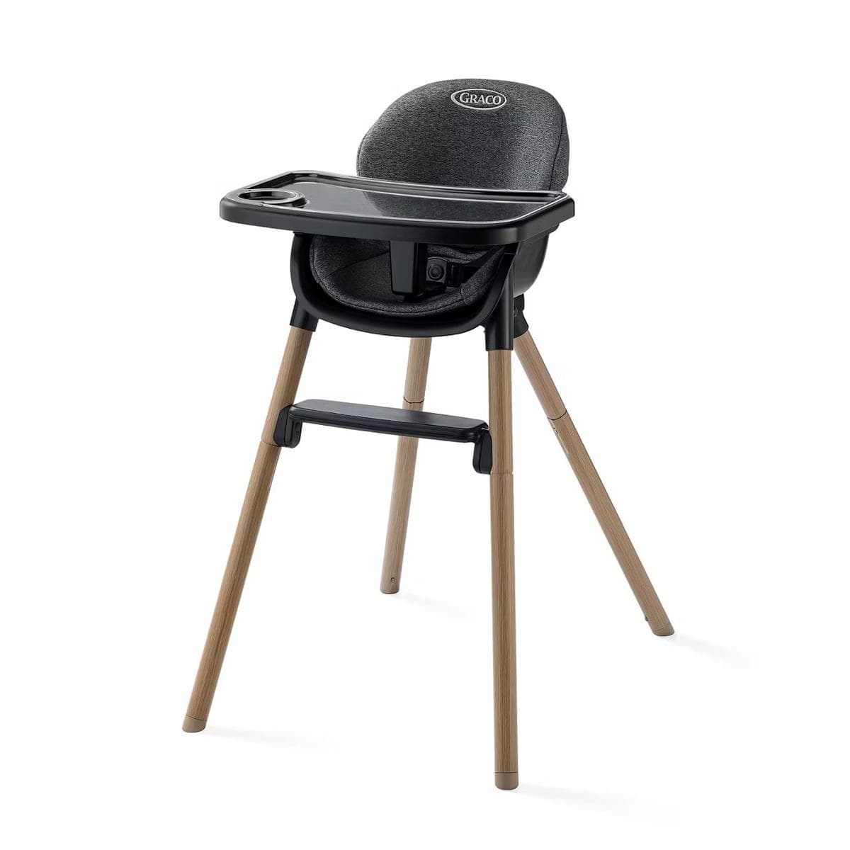 Graco high chair with black seat and tray on light wood legs