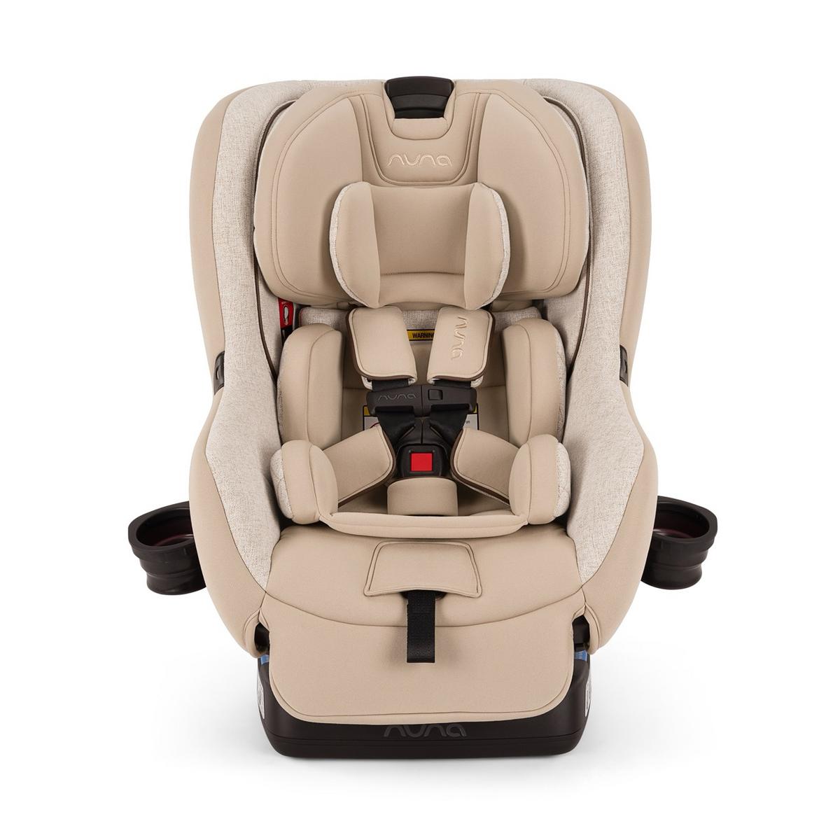 Nuna convertible car seat in beige with five point harness and cup holders
