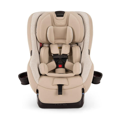 Nuna convertible car seat in beige with five point harness and cup holders